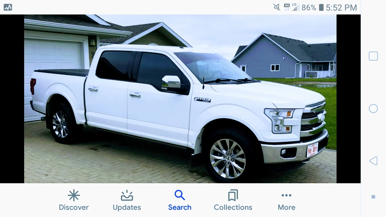 Inside Quality Window Tinting — shop interior and work bay